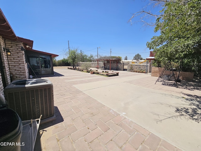 view of patio featuring central AC