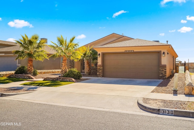 ranch-style home featuring a garage