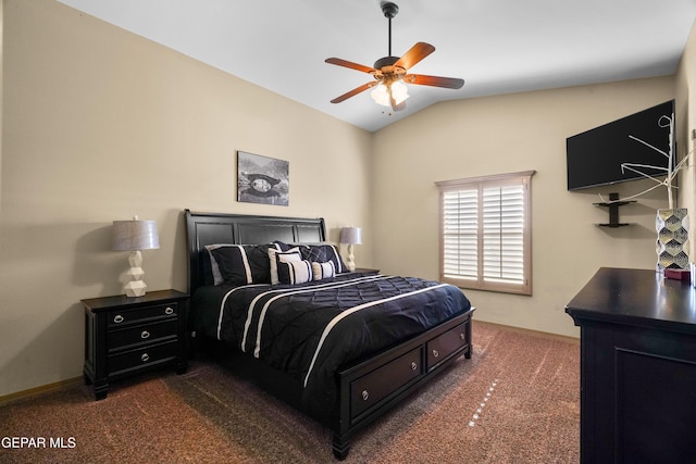 bedroom featuring ceiling fan, lofted ceiling, and dark colored carpet