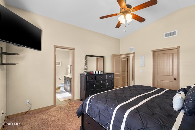 bedroom featuring ceiling fan, light colored carpet, ensuite bath, and lofted ceiling