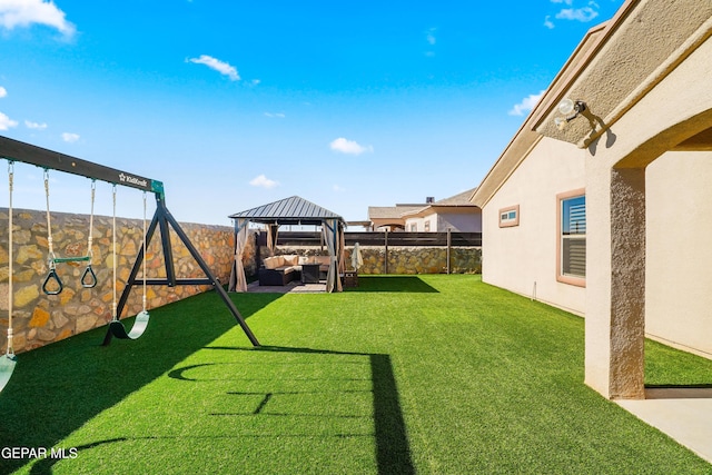 view of yard with an outdoor hangout area and a gazebo