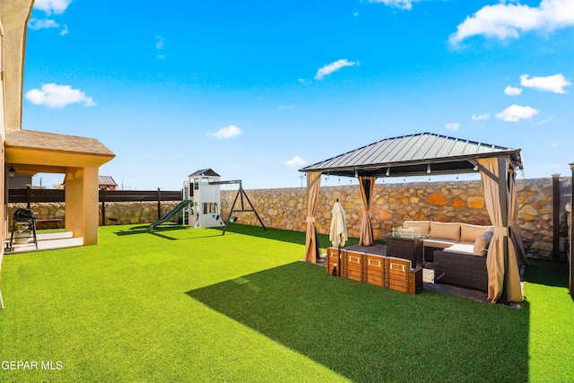 view of yard with a playground, a gazebo, and outdoor lounge area