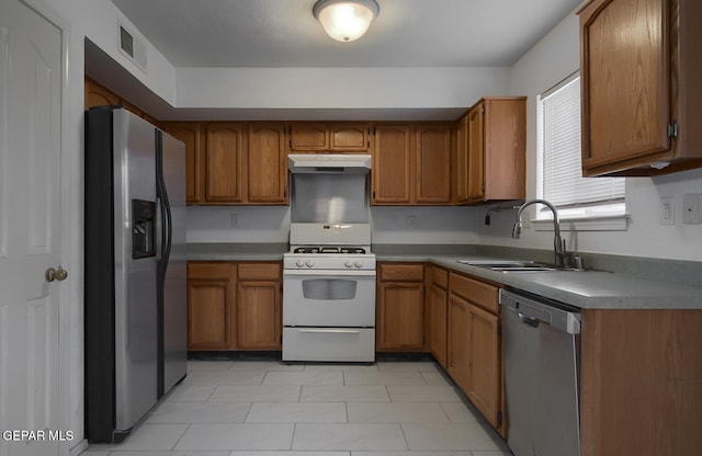 kitchen featuring sink and appliances with stainless steel finishes