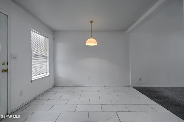 unfurnished room featuring light tile patterned floors