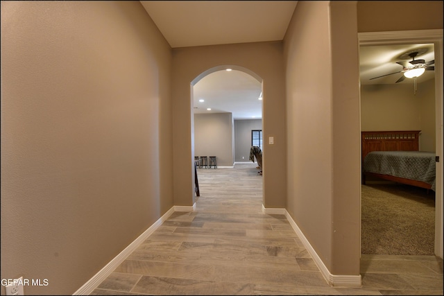 hall with light wood-type flooring