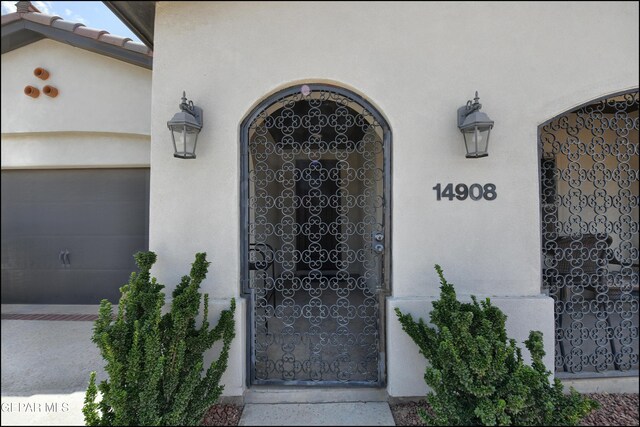 property entrance featuring a garage