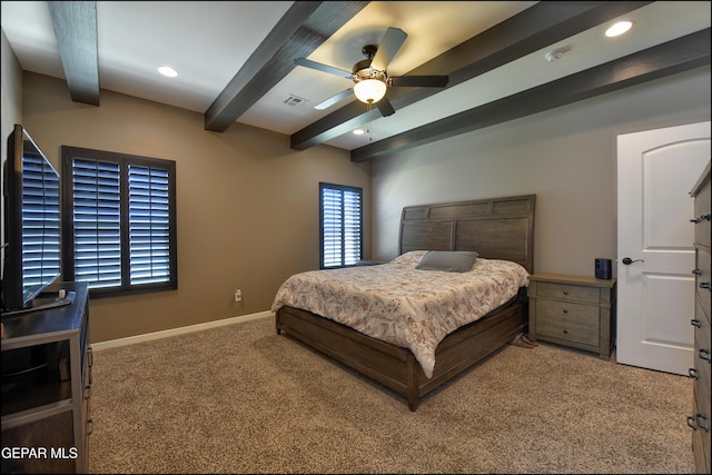 bedroom with beam ceiling, carpet floors, and ceiling fan