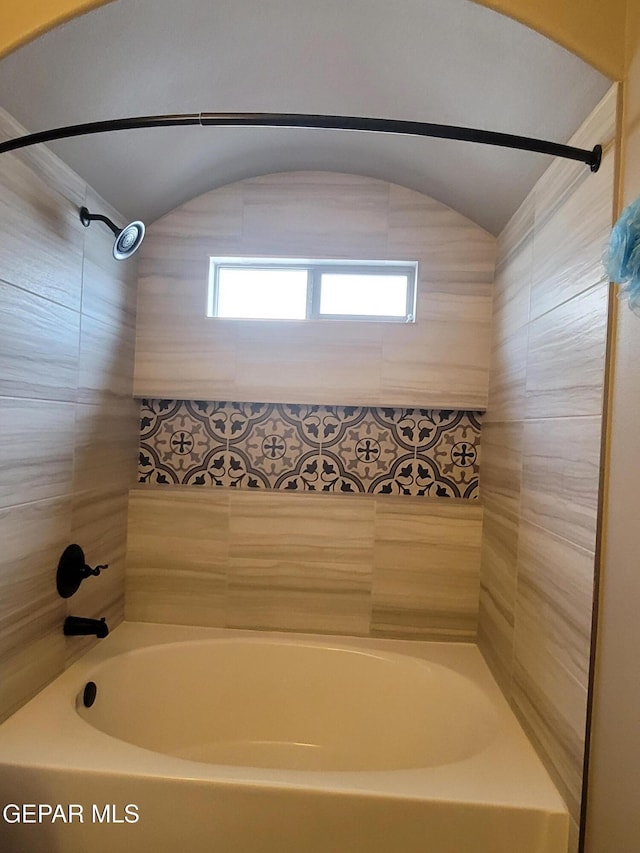 bathroom with shower / tub combination