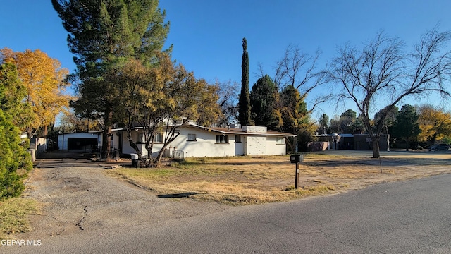 single story home with a garage