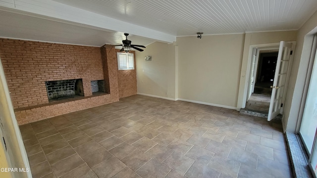 unfurnished living room featuring a brick fireplace and ceiling fan