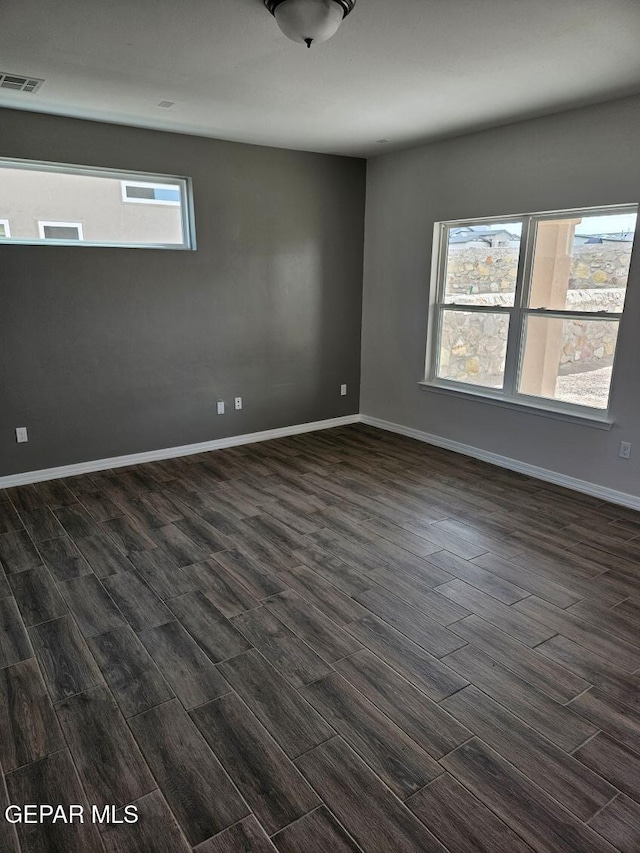 spare room with a wealth of natural light