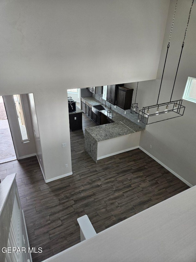 kitchen featuring dark hardwood / wood-style flooring and sink