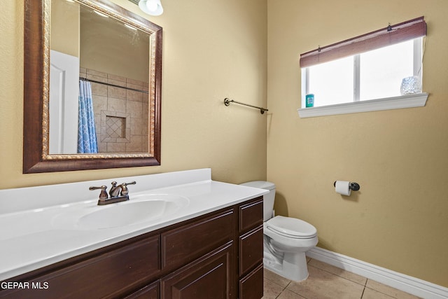 full bathroom with baseboards, toilet, a shower with curtain, tile patterned floors, and vanity