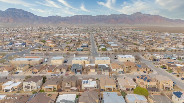 drone / aerial view with a mountain view and a residential view