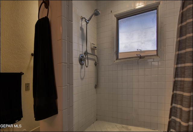 bathroom with curtained shower