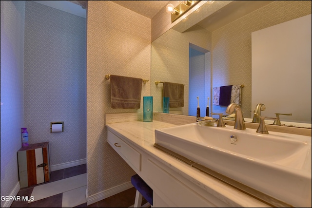 bathroom featuring tile patterned floors and vanity