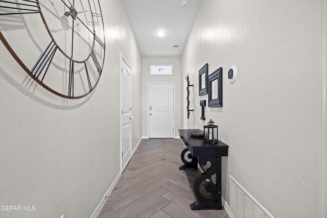 hallway with parquet floors