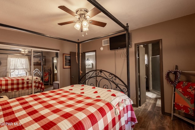 bedroom featuring ceiling fan, dark hardwood / wood-style flooring, and a closet