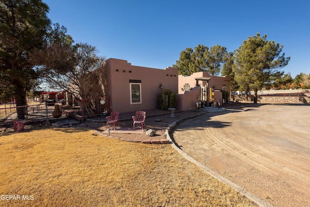 view of adobe home