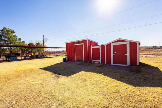 view of outbuilding featuring a rural view