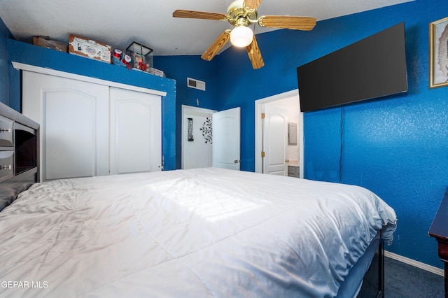 bedroom with carpet, a closet, and ceiling fan