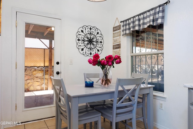 view of tiled dining space