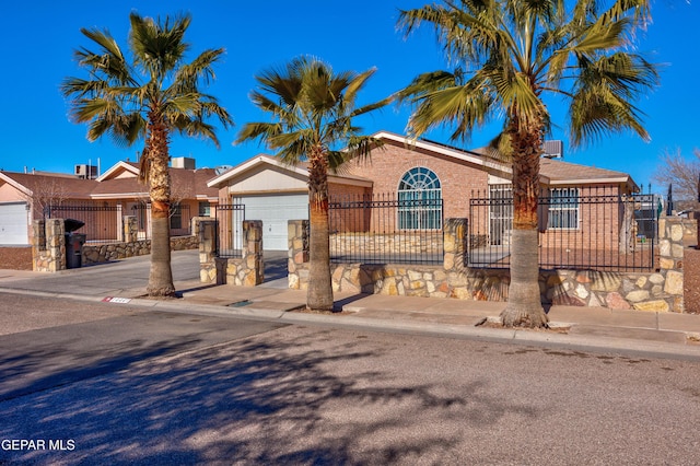 view of front of property featuring a garage