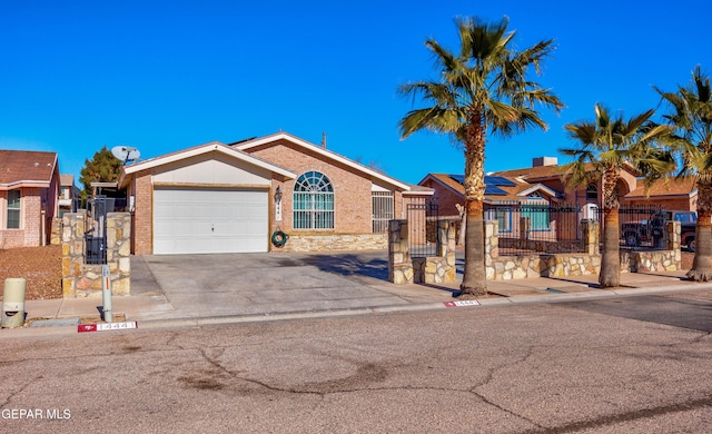 ranch-style house featuring a garage