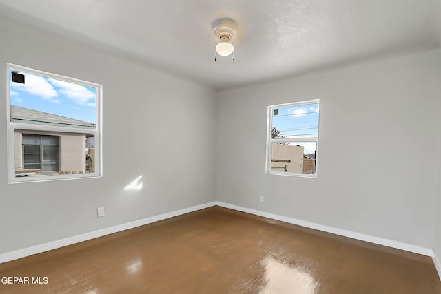 spare room featuring wood-type flooring