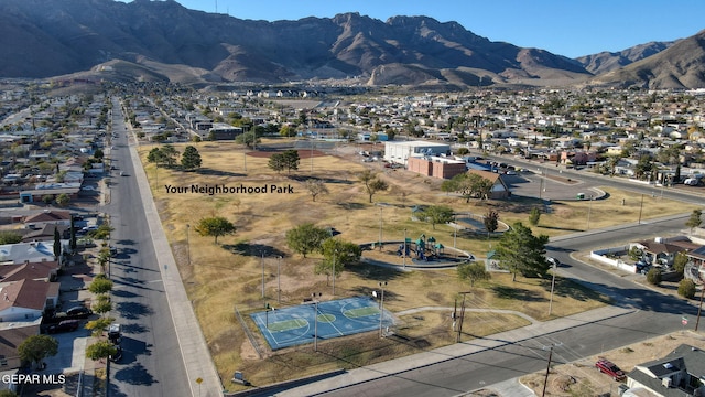 birds eye view of property featuring a mountain view