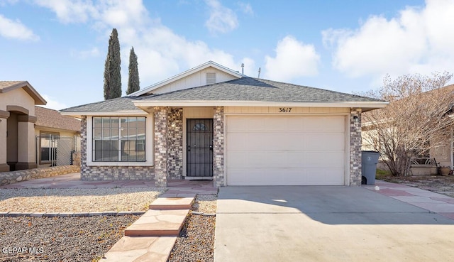 ranch-style home featuring a garage