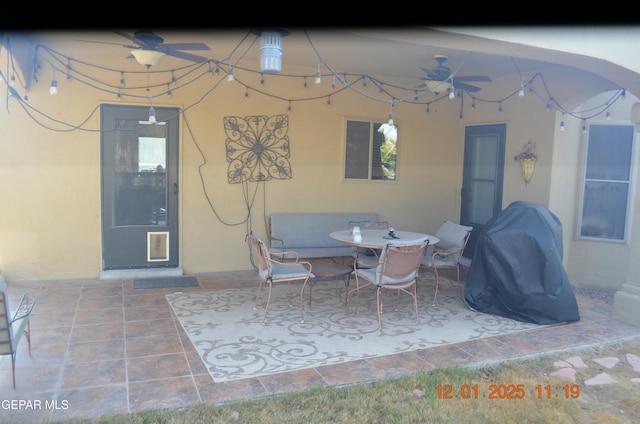 view of patio / terrace with area for grilling and ceiling fan