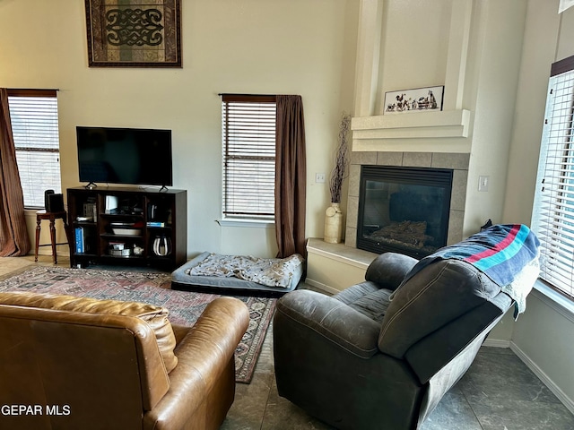 living room featuring a fireplace