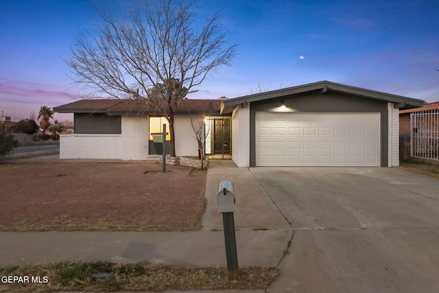 single story home with a garage