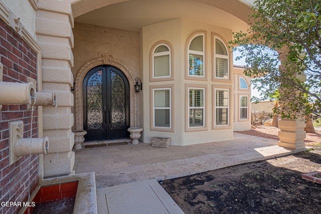 property entrance with french doors