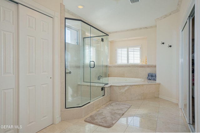 bathroom with tile patterned floors and plus walk in shower