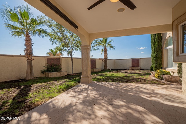 view of patio with ceiling fan