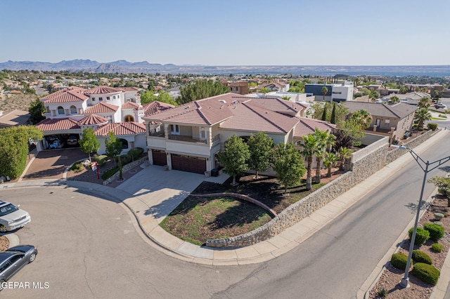 drone / aerial view featuring a mountain view