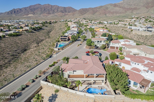 drone / aerial view featuring a mountain view