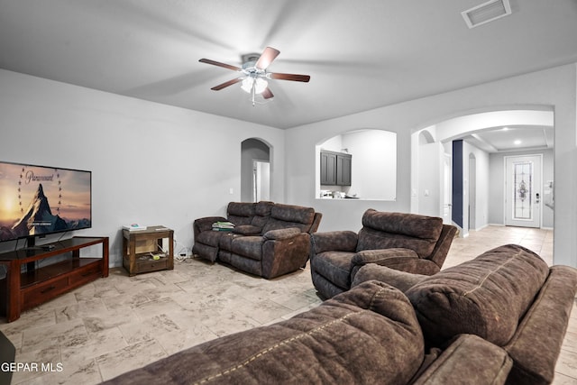 living room featuring ceiling fan