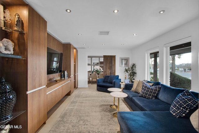 living room with light tile patterned floors