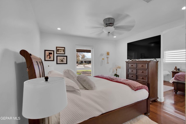 bedroom with ceiling fan and light hardwood / wood-style flooring