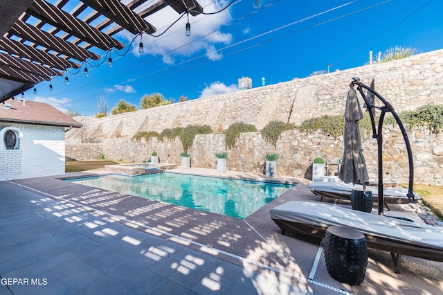 view of pool featuring a patio