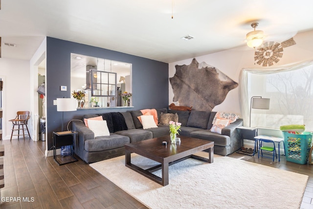 living room featuring ceiling fan