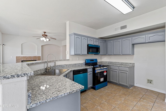 kitchen with dishwasher, gas stove, sink, kitchen peninsula, and ceiling fan