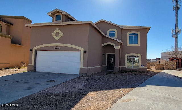 front of property featuring a garage