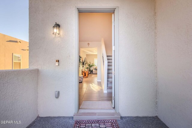 property entrance with a balcony