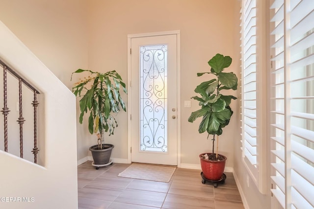 view of tiled foyer entrance