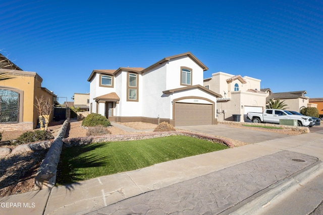 mediterranean / spanish home featuring a garage