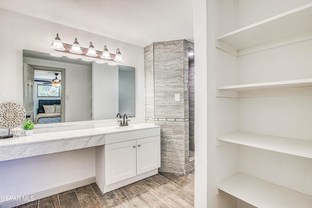 bathroom with vanity and ceiling fan